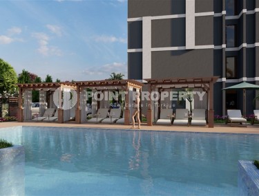 Бюджетные студии в строящемся жилом комплексе на берегу Средиземного моря, в живописном районе Мерсина - Тедже-id-5968-фото-3