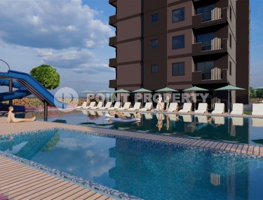 A new project in the picturesque area of Mersin - Cesmeli - a 10-storey residential complex with rich internal infrastructure-id-5973-photo-2