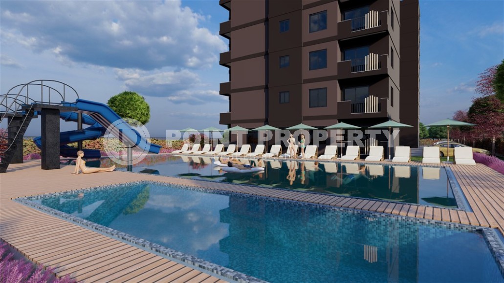 A new project in the picturesque area of Mersin - Cesmeli - a 10-storey residential complex with rich internal infrastructure-id-5973-photo-2