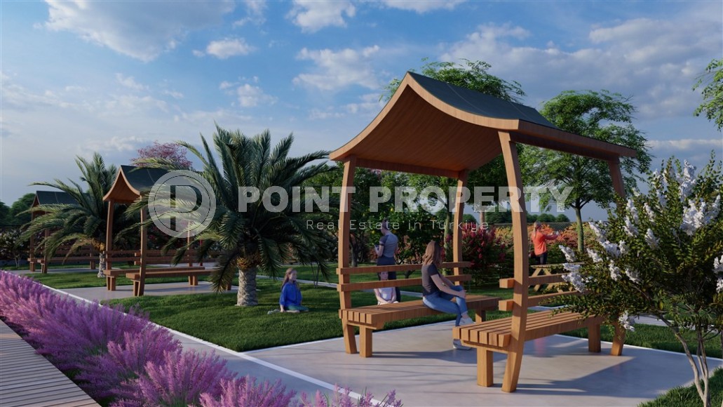 A new project in the picturesque area of Mersin - Cesmeli - a 10-storey residential complex with rich internal infrastructure-id-5973-photo-4