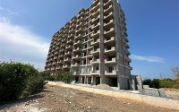 A new project in the picturesque area of Mersin - Cesmeli - a 10-storey residential complex with rich internal infrastructure-id-5973-photo-11