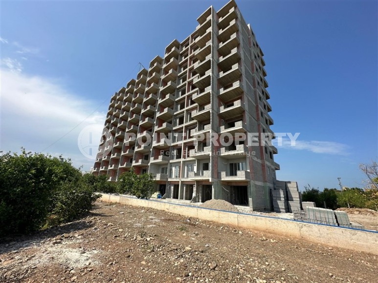 A new project in the picturesque area of Mersin - Cesmeli - a 10-storey residential complex with rich internal infrastructure-id-5973-photo-11