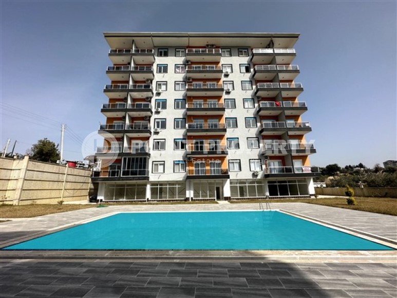 Компактная квартира 1+1, на площади 55 м2, в спокойном районе Аланьи - Авсаллар-id-5977-фото-2