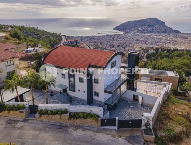 Luxurious three-storey villa 14+2, overlooking the sea and the Alanya fortress, in a prestigious area of the city - Bektash-id-5979-photo-1