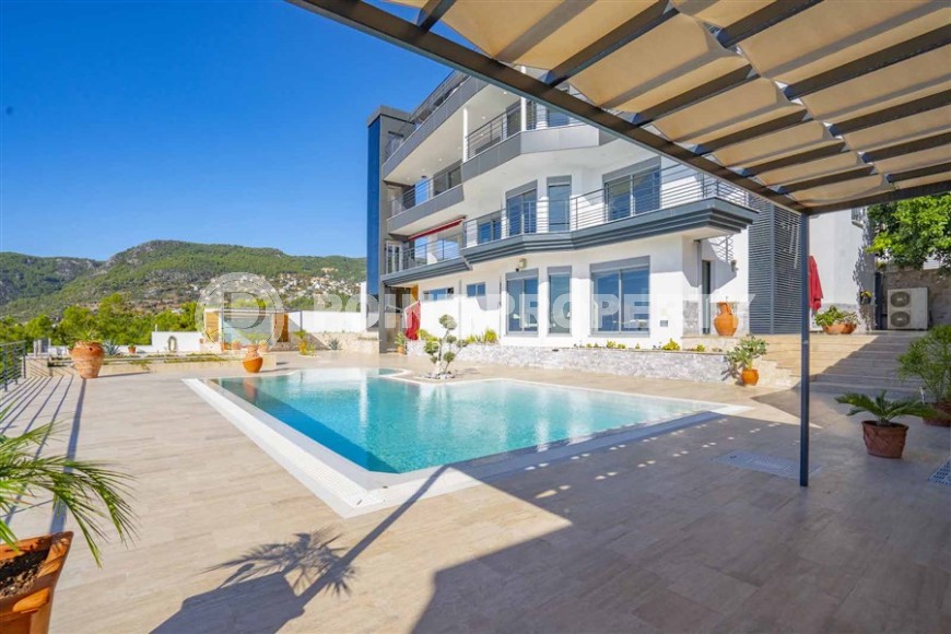 Роскошная трехэтажная вилла 14+2, с видом на море и крепость Аланьи, в престижном районе города - Бекташ-id-5979-фото-22