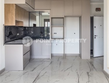 Apartments in a residential complex at the final stage of construction, one and a half kilometers from the sea-id-5999-photo-1