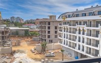Apartments in a residential complex at the final stage of construction, one and a half kilometers from the sea-id-5999-photo-11