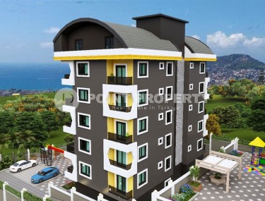 Apartments and duplexes in a residential complex under construction, in the promising area of Alanya - Ciplakli-id-6008-photo-1