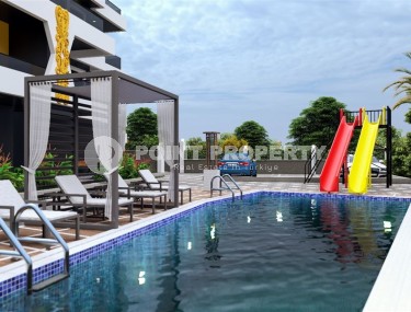 Apartments and duplexes in a residential complex under construction, in the promising area of Alanya - Ciplakli-id-6008-photo-4