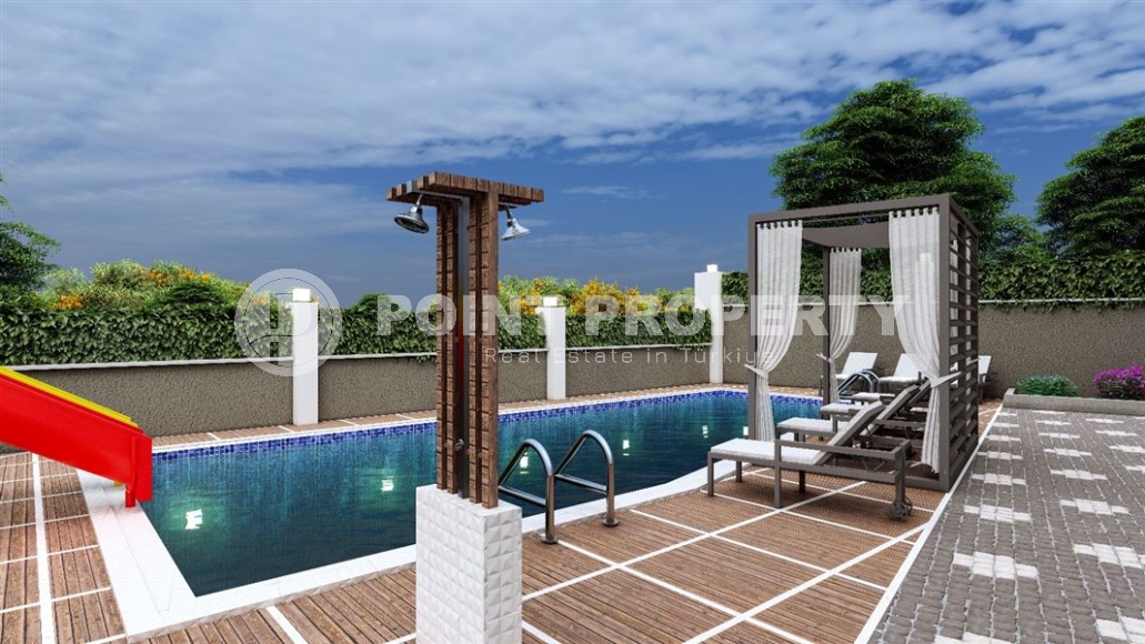 Apartments and duplexes in a residential complex under construction, in the promising area of Alanya - Ciplakli-id-6008-photo-5