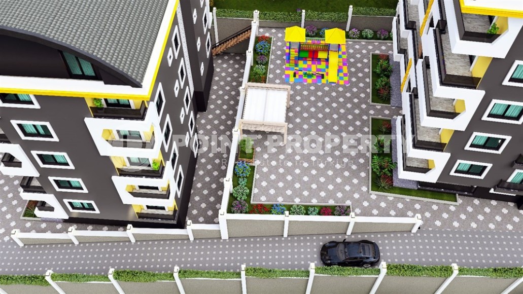 Apartments and duplexes in a residential complex under construction, in the promising area of Alanya - Ciplakli-id-6008-photo-10