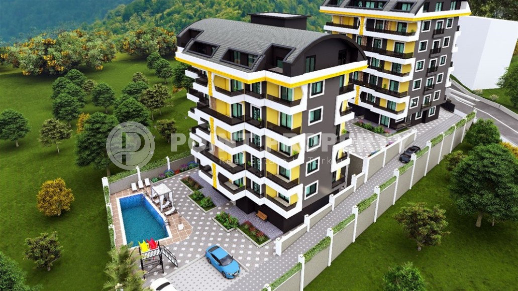 Apartments and duplexes in a residential complex under construction, in the promising area of Alanya - Ciplakli-id-6008-photo-11