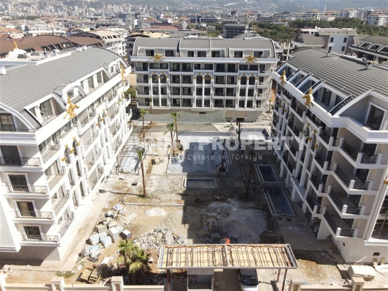 Квартиры и дуплексы в жилом комплексе на финальном этапе строительства, в полутора километрах от моря-id-6019-фото-21