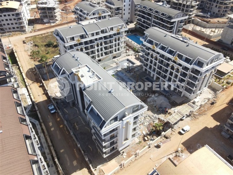 Квартиры и дуплексы в жилом комплексе на финальном этапе строительства, в полутора километрах от моря-id-6019-фото-22