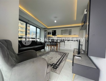 Квартира с современным дизайном и светлым приятным интерьером, в 700 метрах от моря, в центре Аланьи-id-6030-фото-2