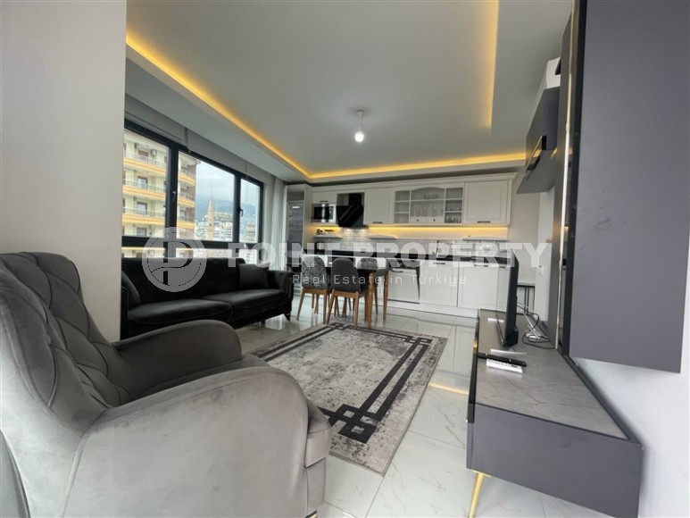 Квартира с современным дизайном и светлым приятным интерьером, в 700 метрах от моря, в центре Аланьи-id-6030-фото-2