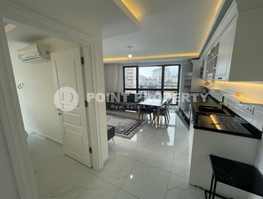 Квартира с современным дизайном и светлым приятным интерьером, в 700 метрах от моря, в центре Аланьи-id-6030-фото-4