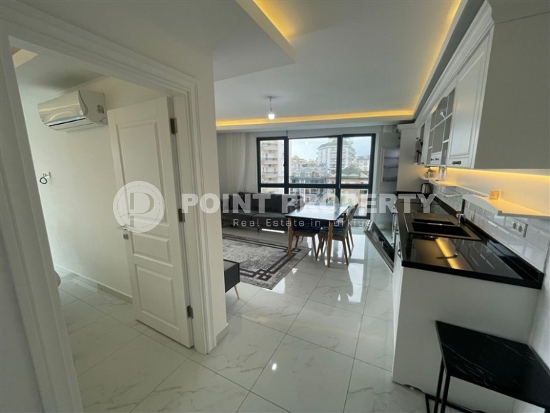 Квартира с современным дизайном и светлым приятным интерьером, в 700 метрах от моря, в центре Аланьи-id-6030-фото-4
