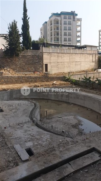 Компактная квартира в жилом комплексе на финальном этапе строительства в спокойном районе Аланьи - Авсаллар-id-6031-фото-9