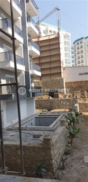 Компактная квартира в жилом комплексе на финальном этапе строительства в спокойном районе Аланьи - Авсаллар-id-6031-фото-10