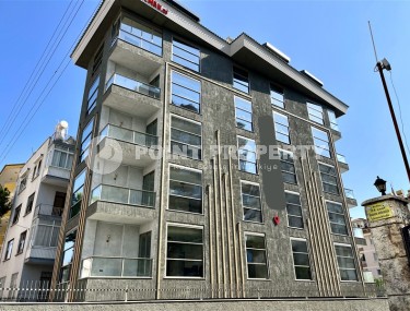Новая квартира с высококачественной чистовой отделкой, в 150 метрах от роскошного пляжа Клеопатры, в центре Аланьи-id-6034-фото-1