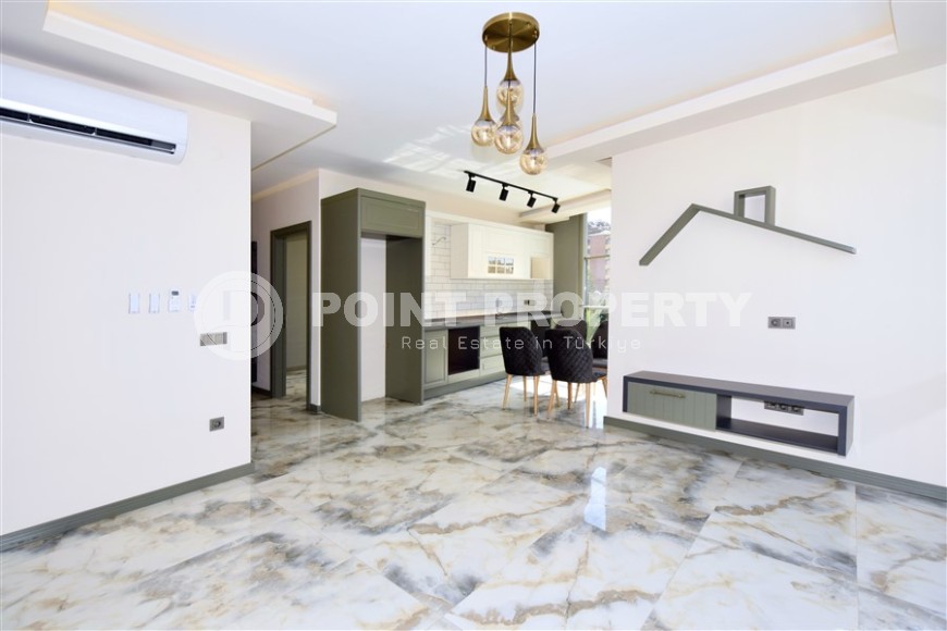 New apartment with high quality finishing, 150 meters from the luxurious Cleopatra Beach, in the center of Alanya-id-6034-photo-2