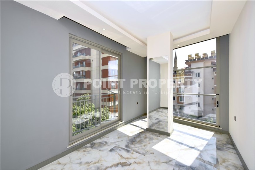 New apartment with high quality finishing, 150 meters from the luxurious Cleopatra Beach, in the center of Alanya-id-6034-photo-9