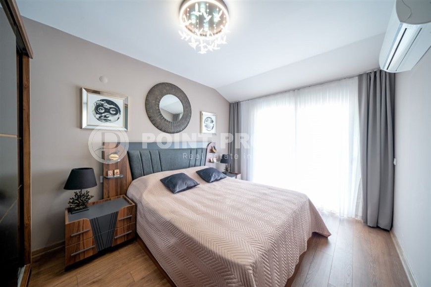 Современная квартира с мебелью и бытовой техникой, на 9-м этаже с мансардой, в районе Авсаллар-id-6035-фото-4