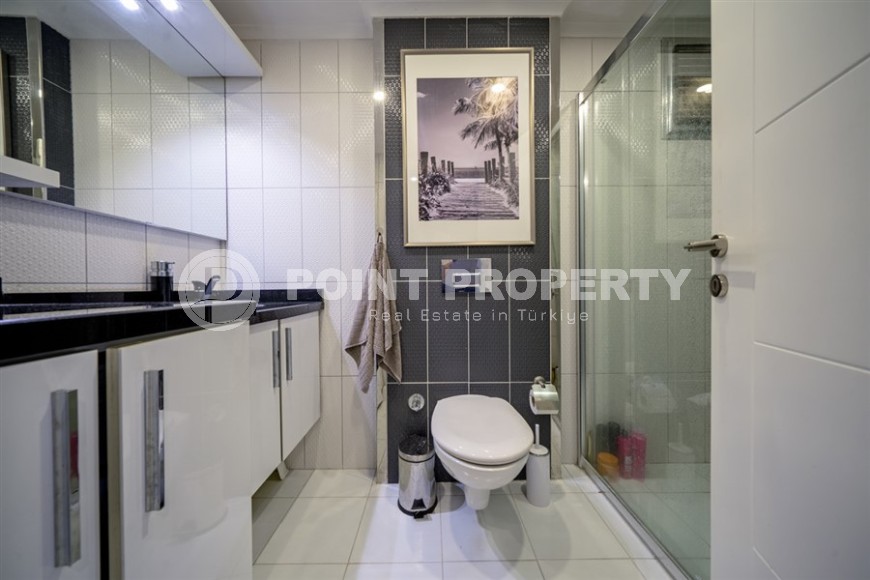 Современная квартира с мебелью и бытовой техникой, на 9-м этаже с мансардой, в районе Авсаллар-id-6035-фото-8