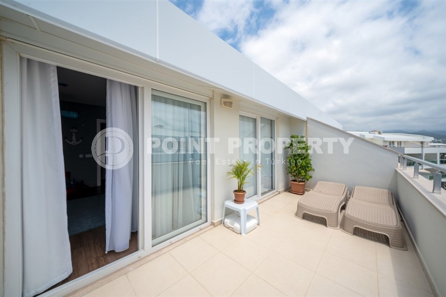 Современная квартира с мебелью и бытовой техникой, на 9-м этаже с мансардой, в районе Авсаллар-id-6035-фото-11