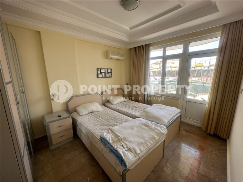 Меблированная двухуровневая квартира на 7-м этаже с мансардой, в 300 метрах от пляжа, в центре спокойного района Аланьи - Тосмур-id-6037-фото-4