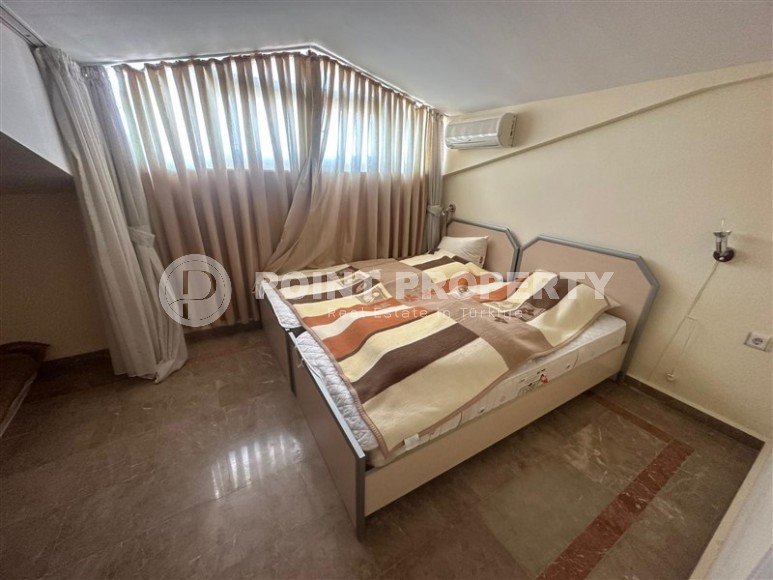 Меблированная двухуровневая квартира на 7-м этаже с мансардой, в 300 метрах от пляжа, в центре спокойного района Аланьи - Тосмур-id-6037-фото-6