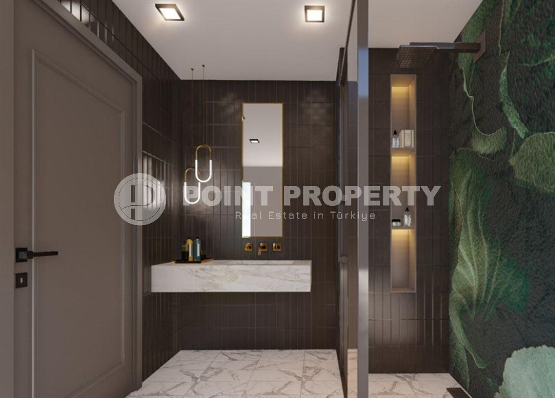 Новый инвестиционный проект - комфортабельный жилой комплекс в 600 метрах от моря, в центре района Авсаллар-id-6043-фото-5