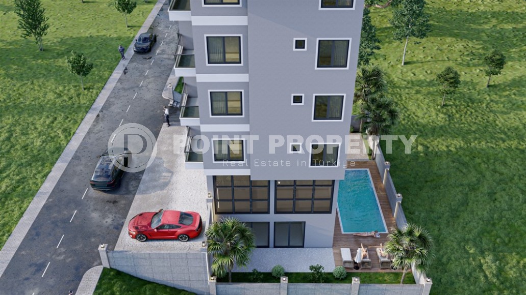 Новый инвестиционный проект - комфортабельный жилой комплекс в 600 метрах от моря, в центре района Авсаллар-id-6043-фото-7