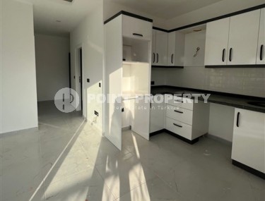 Небольшая квартира с чистовой отделкой в 300 метрах от моря, в престижном, спокойном районе Аланьи - Каргыджак-id-6044-фото-2