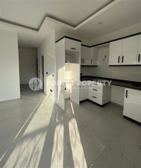 Небольшая квартира с чистовой отделкой в 300 метрах от моря, в престижном, спокойном районе Аланьи - Каргыджак-id-6044-фото-2