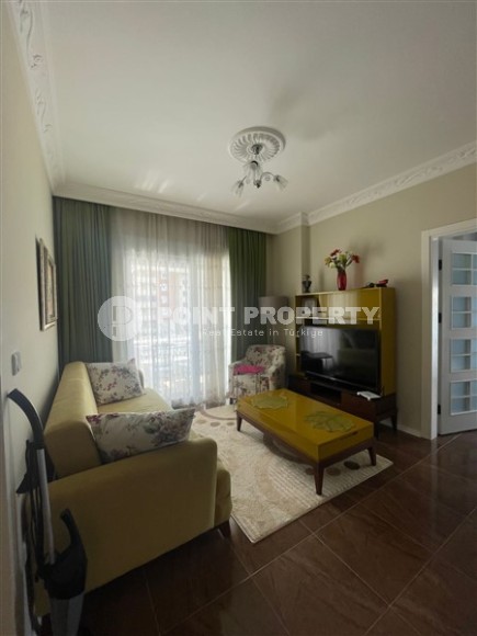 Комфортабельная квартира на 4-м этаже в жилом комплексе 2015 года постройки, в центре района Махмутлар-id-6058-фото-2