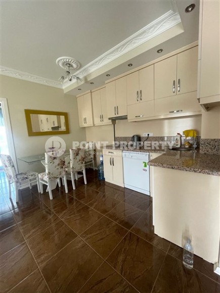 Комфортабельная квартира на 4-м этаже в жилом комплексе 2015 года постройки, в центре района Махмутлар-id-6058-фото-3