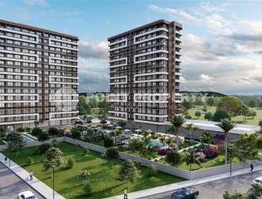 Compact apartments with fine finishing, in a residential complex at the initial stage of construction, in the resort area of Mersin - Tomyuk-id-6069-photo-1