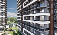 Компактные квартиры с чистовой отделкой, в жилом комплексе на начальном этапе строительства, в курортном районе Мерсина - Томюк-id-6069-фото-14