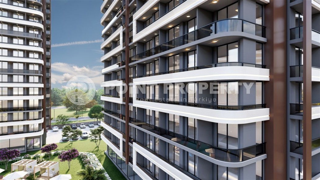 Compact apartments with fine finishing, in a residential complex at the initial stage of construction, in the resort area of Mersin - Tomyuk-id-6069-photo-14