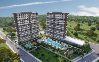 Компактные квартиры с чистовой отделкой, в жилом комплексе на начальном этапе строительства, в курортном районе Мерсина - Томюк-id-6069-фото-16