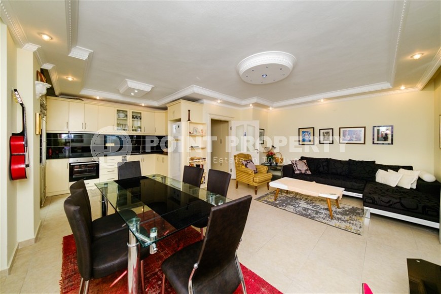 Modern apartment with spacious glazed balconies, five minutes walk from the center of Alanya-id-6071-photo-1