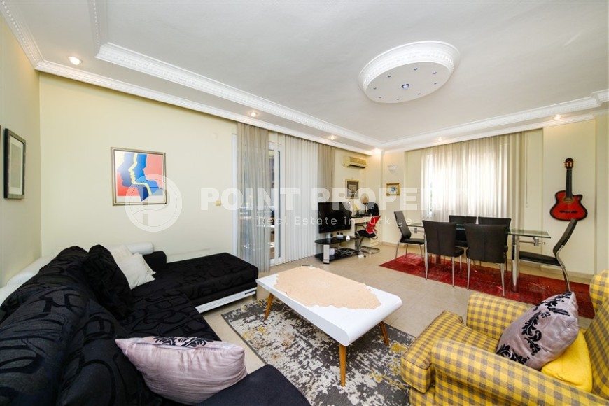 Modern apartment with spacious glazed balconies, five minutes walk from the center of Alanya-id-6071-photo-3