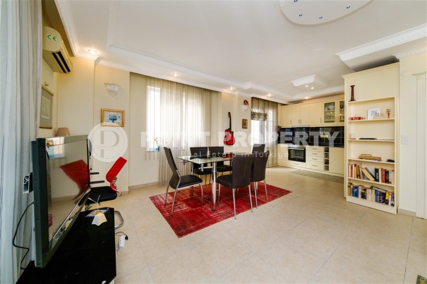 Modern apartment with spacious glazed balconies, five minutes walk from the center of Alanya-id-6071-photo-4