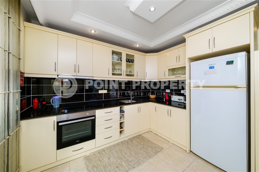 Modern apartment with spacious glazed balconies, five minutes walk from the center of Alanya-id-6071-photo-5