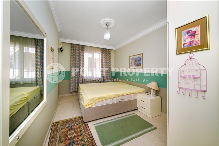 Modern apartment with spacious glazed balconies, five minutes walk from the center of Alanya-id-6071-photo-6