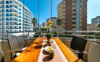 Modern apartment with spacious glazed balconies, five minutes walk from the center of Alanya-id-6071-photo-11