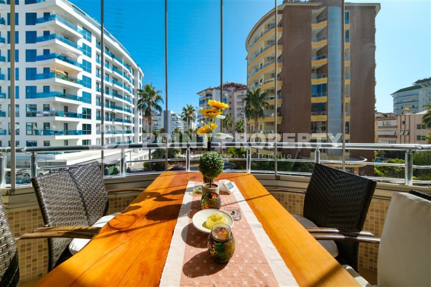 Modern apartment with spacious glazed balconies, five minutes walk from the center of Alanya-id-6071-photo-11