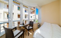 Modern apartment with spacious glazed balconies, five minutes walk from the center of Alanya-id-6071-photo-15